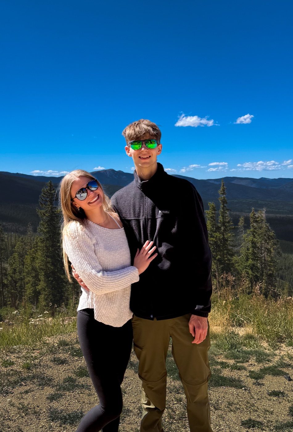 Grace and Gage at a mountain overlook in Grand County